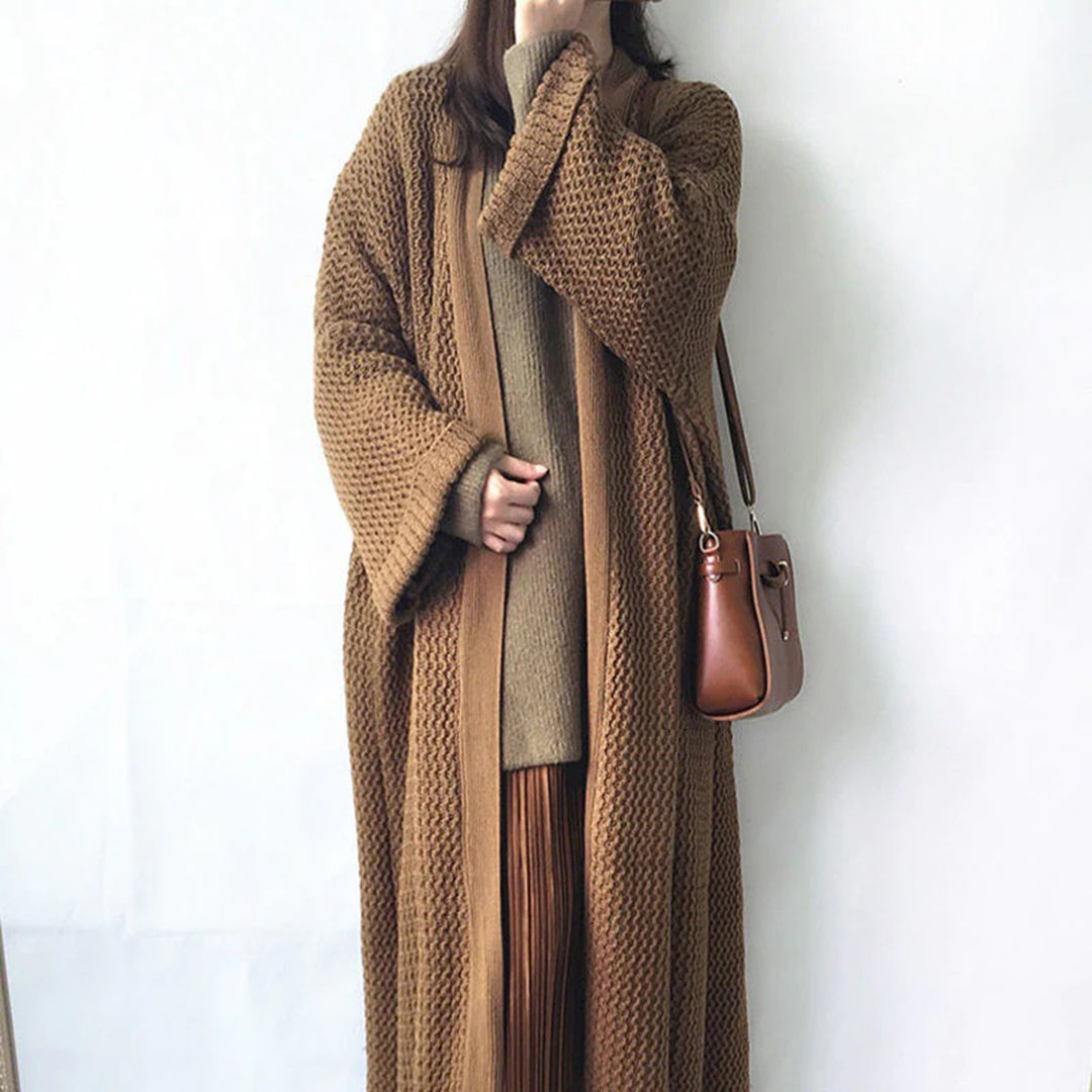 Stylische Strickjacke in Übergröße, bequem und modern, ideal für entspannte und modische Looks.