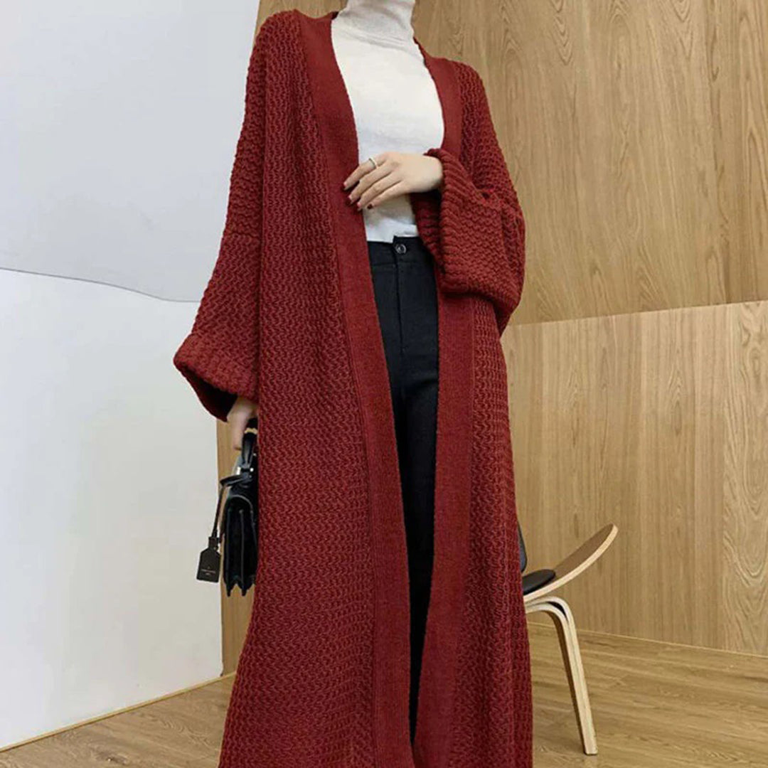 Stylische Strickjacke in Übergröße, bequem und modern, ideal für entspannte und modische Looks.