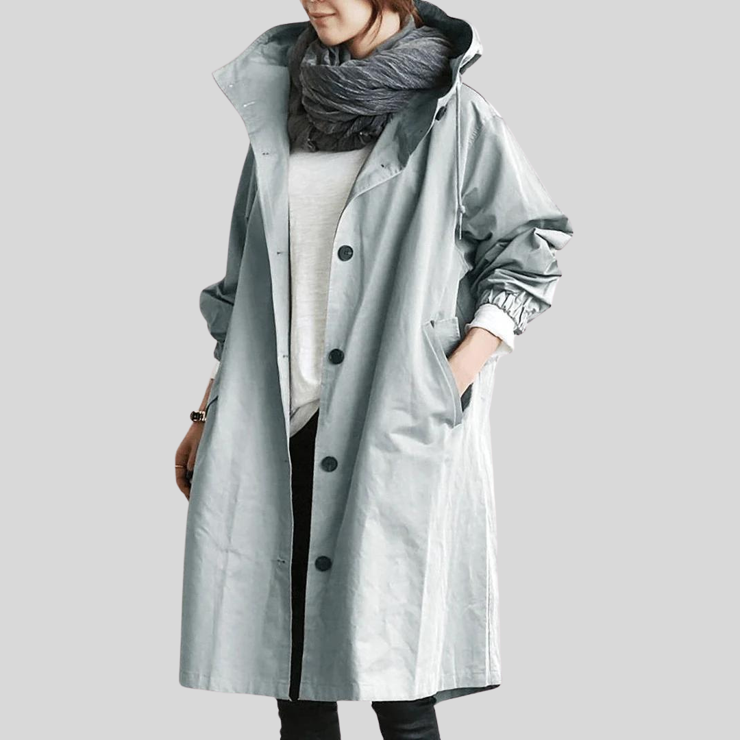 Wasserdichter Mantel mit Kapuze für Frauen, ideal für regnerische Tage und kaltes Wetter.