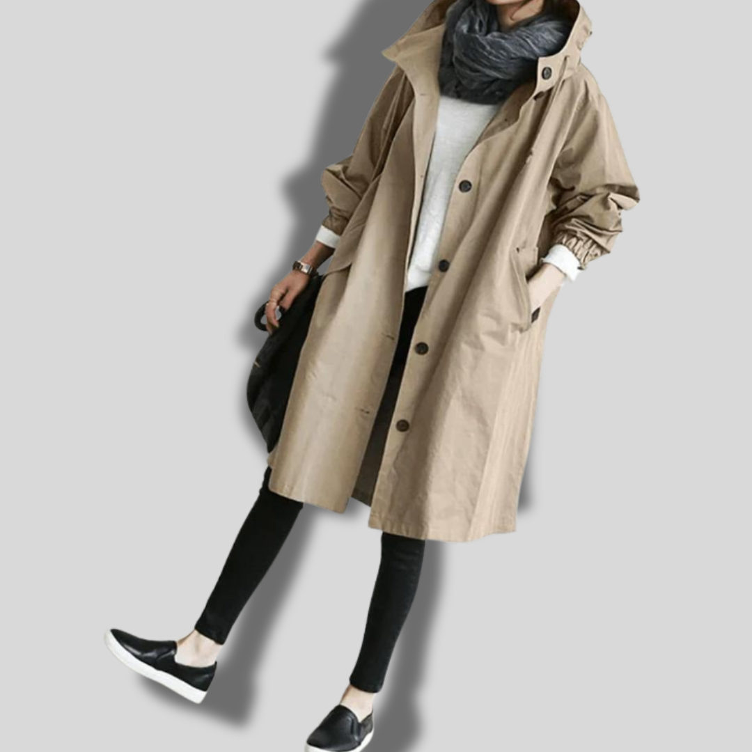 Wasserdichter Mantel mit Kapuze für Frauen, ideal für regnerische Tage und kaltes Wetter.
